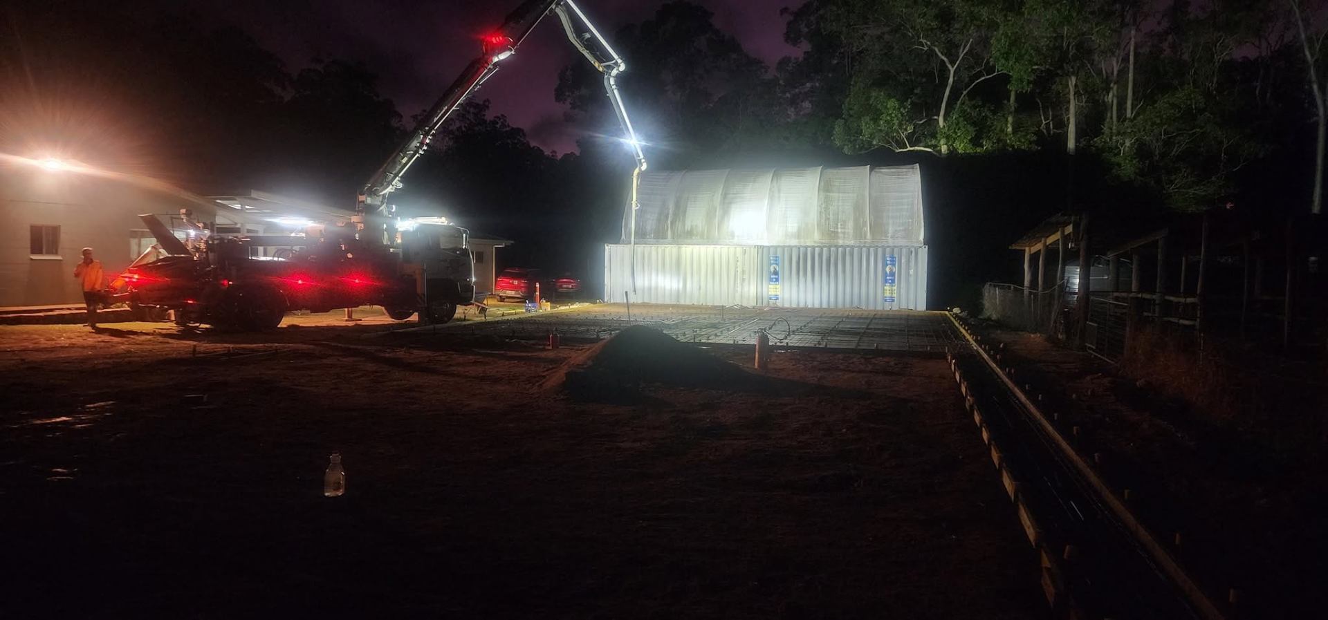 Night pour  -  shed slab with pump truck, Atherton Tablelands  -  Crest Concreting